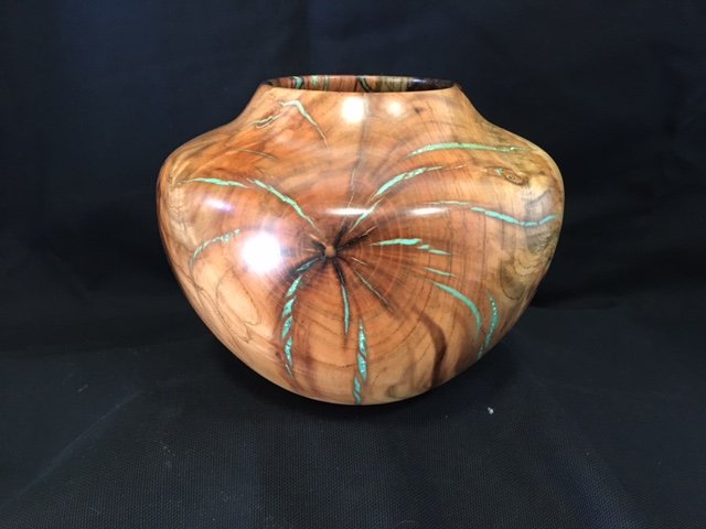 Pistachio hollow form with turquoise inlay