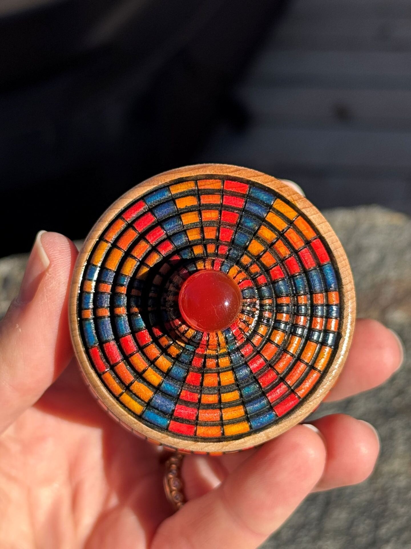 Red, Orange, Yellow and Blue Zulu Herb Basket Illusion Box with Carnelian Cabochon (top view)