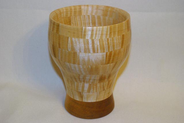 Segmented curly maple with Mahogany base