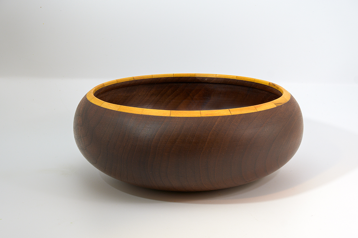 Slightly segmented walnut bowl