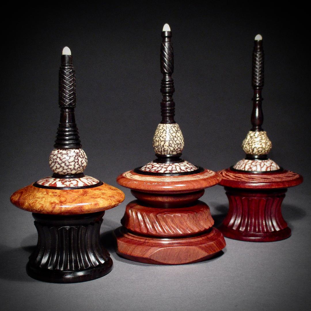 Spin Tops on their stands. American Association of Woodturners