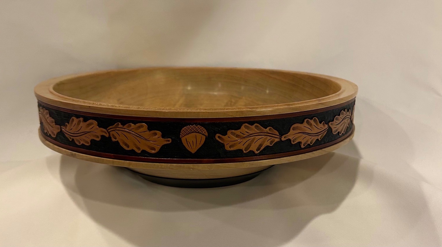Tooled leather inlayed bowl
