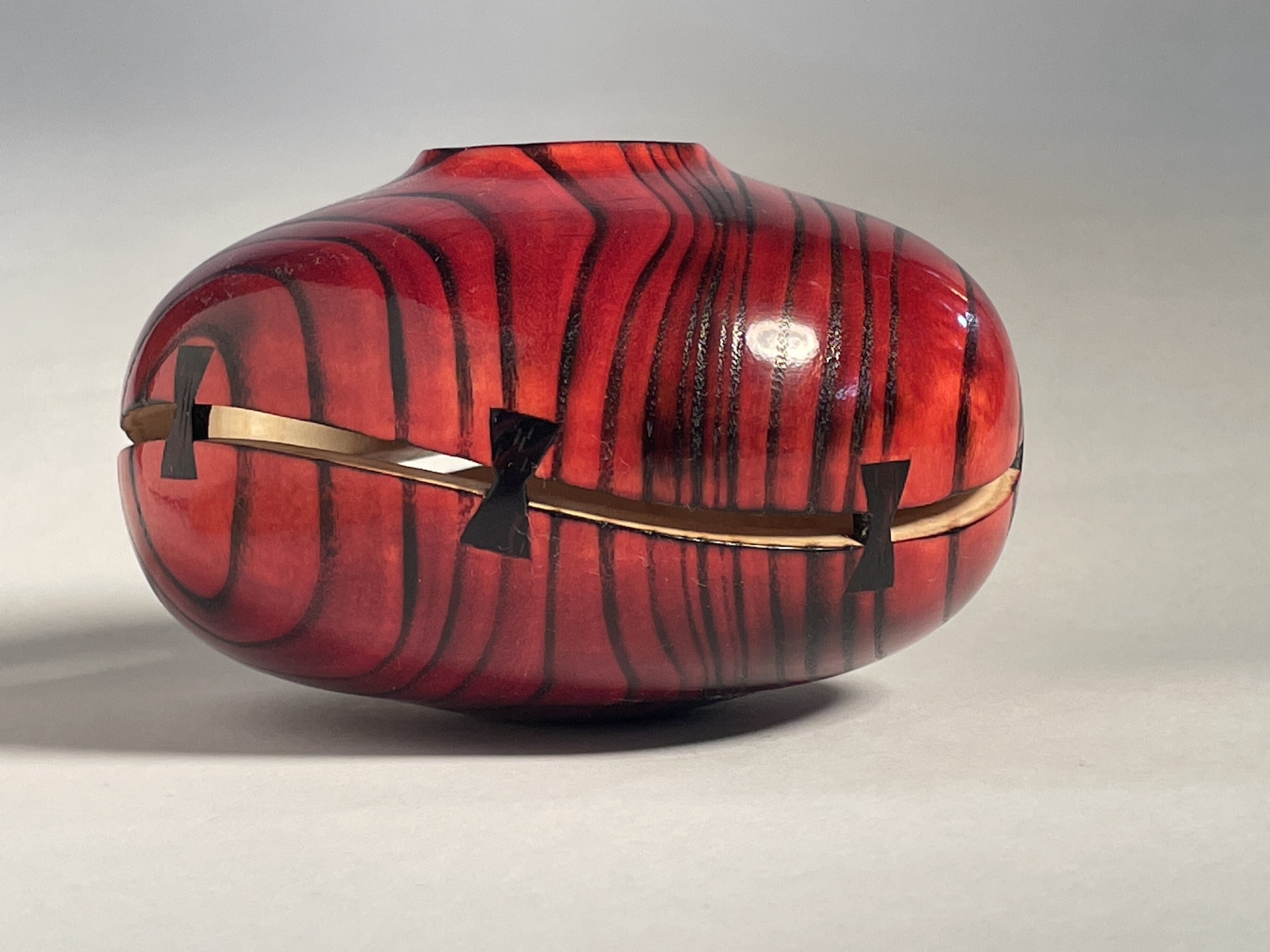 Torched, Dyed, and Sliced Hollow Form