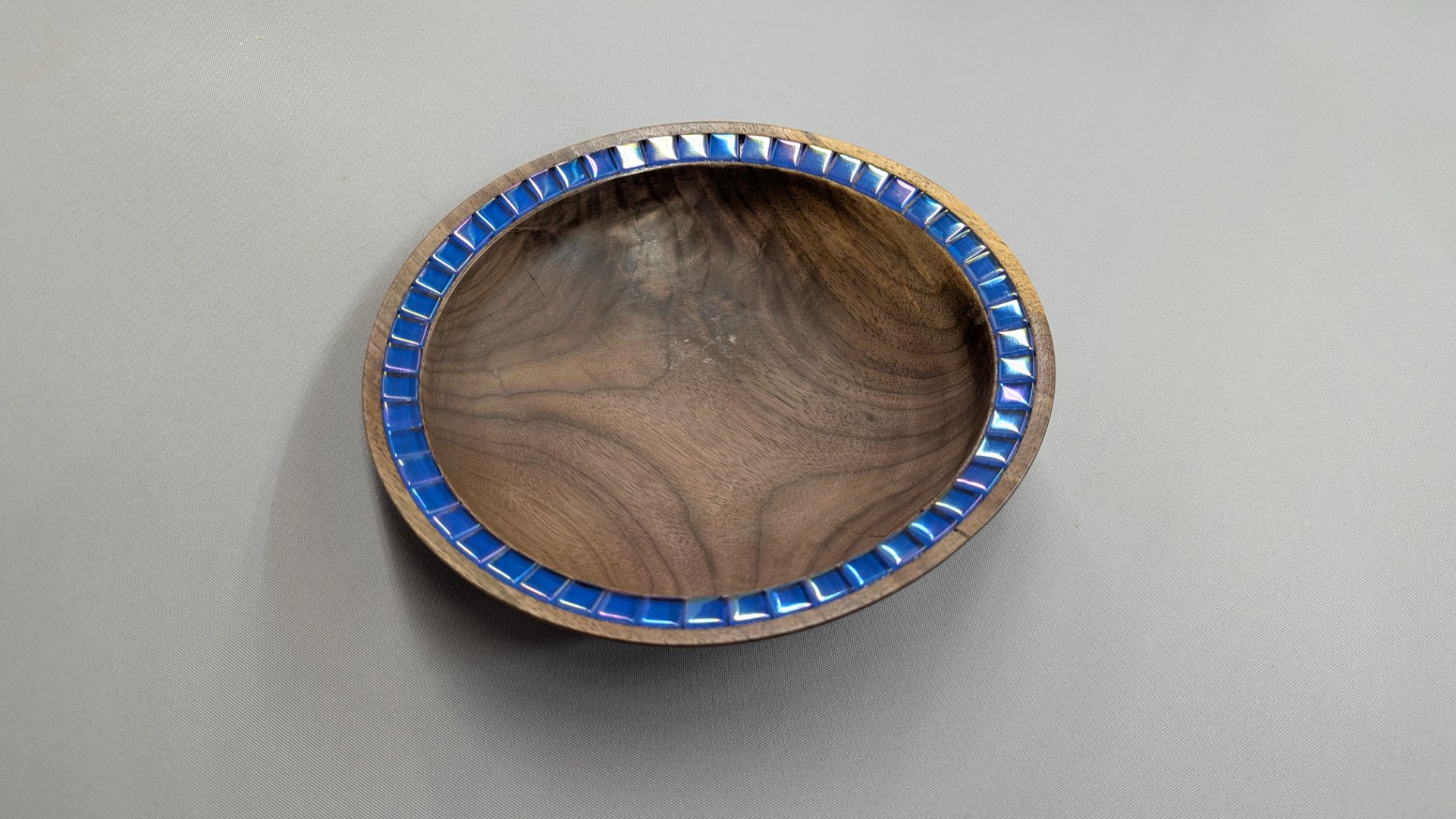 Walnut bowl with glass tile rim