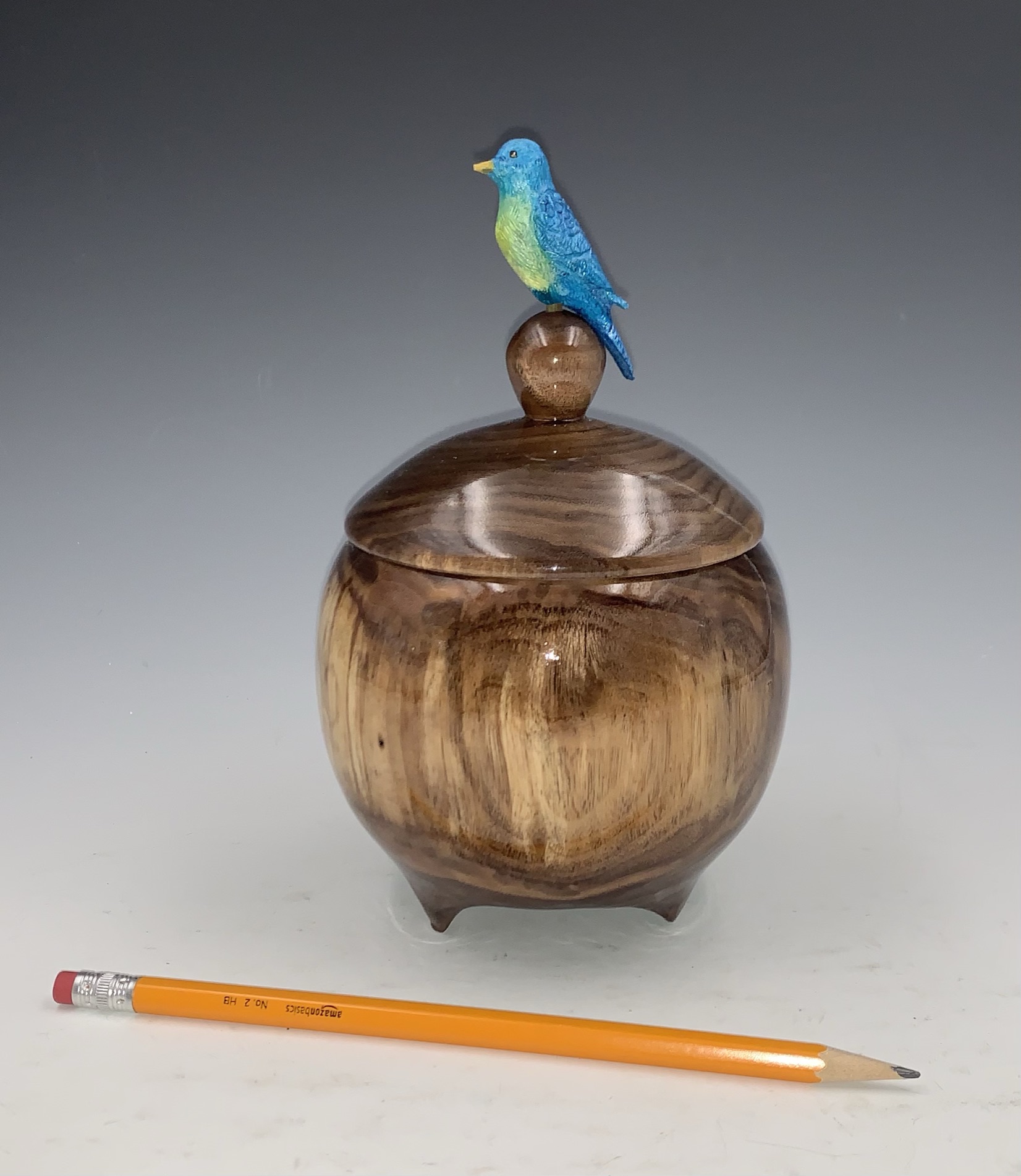 Walnut box with hand carved bird